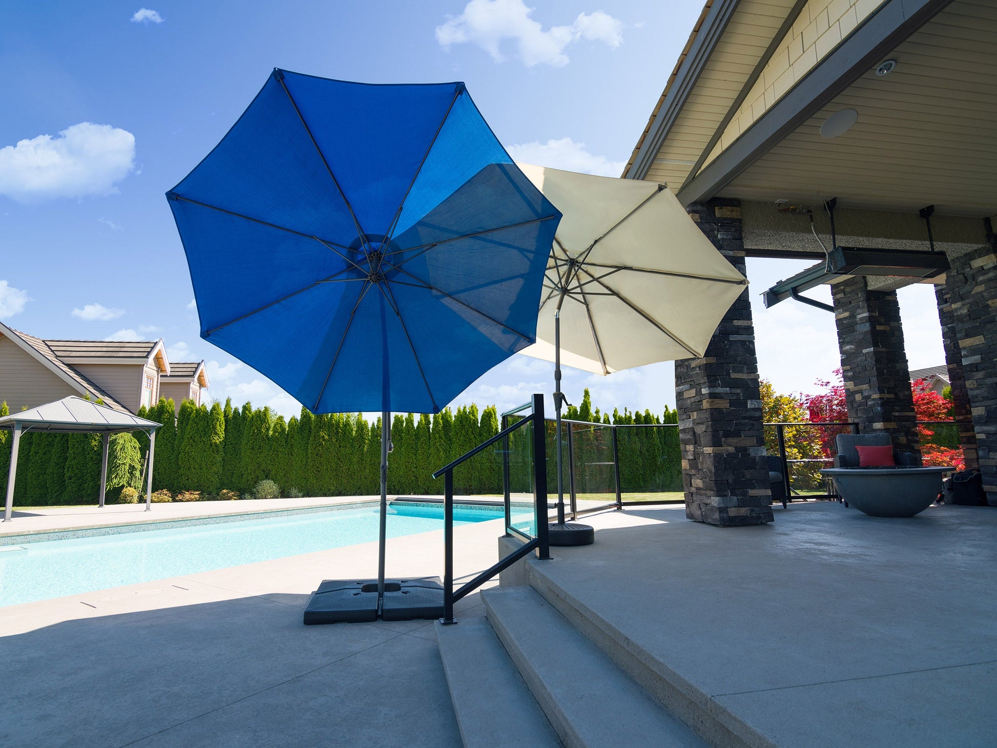 corliving 9.5ft offset fabric patio umbrella and base weight Tilting Offset Patio Umbrella