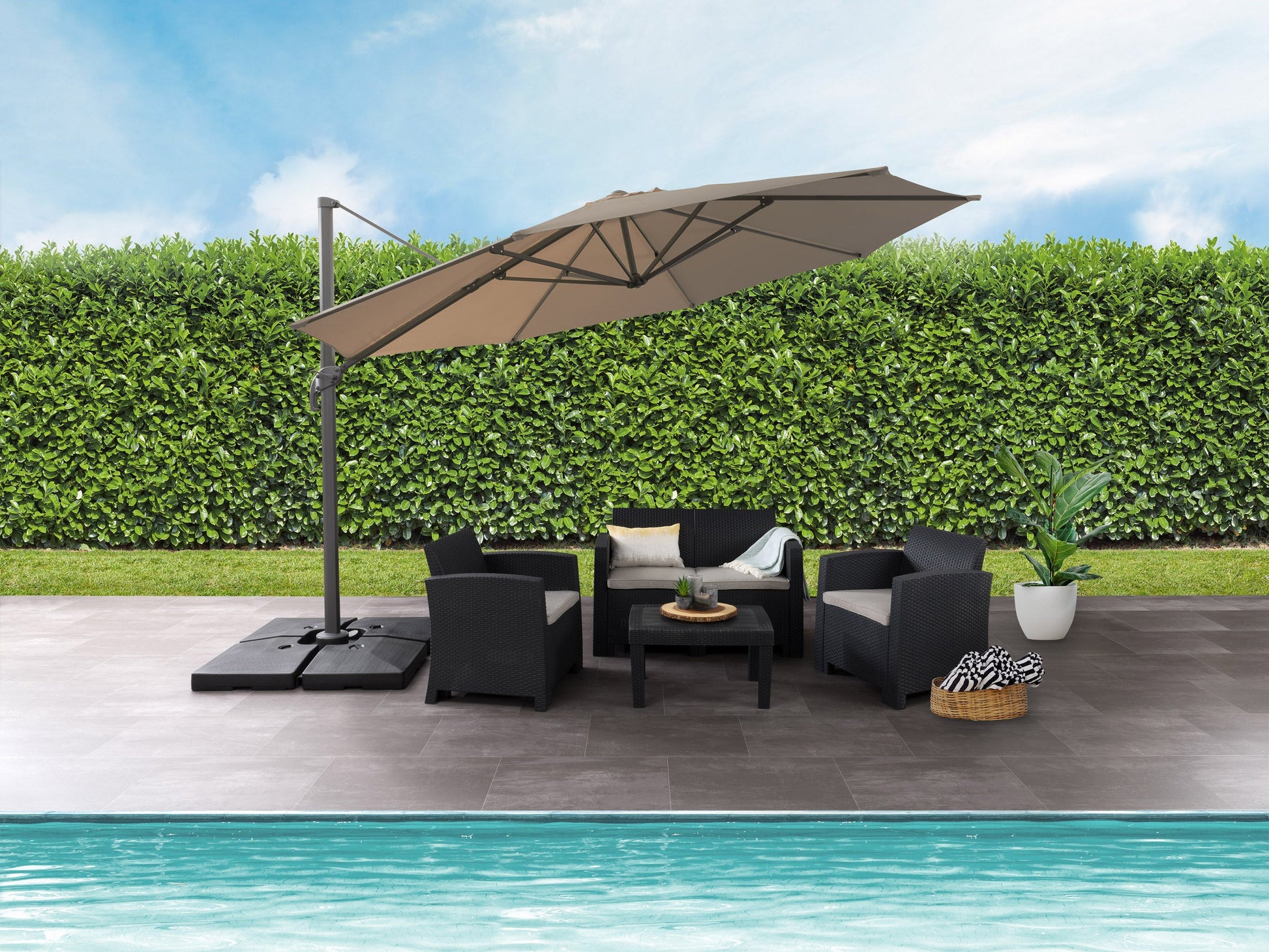Brown 11.5ft deluxe offset patio umbrella with a sturdy aluminum frame, UV-resistant polyester canopy, and easy-to-use crank lift system. Ideal for outdoor spaces like patios, gardens, and poolside areas.