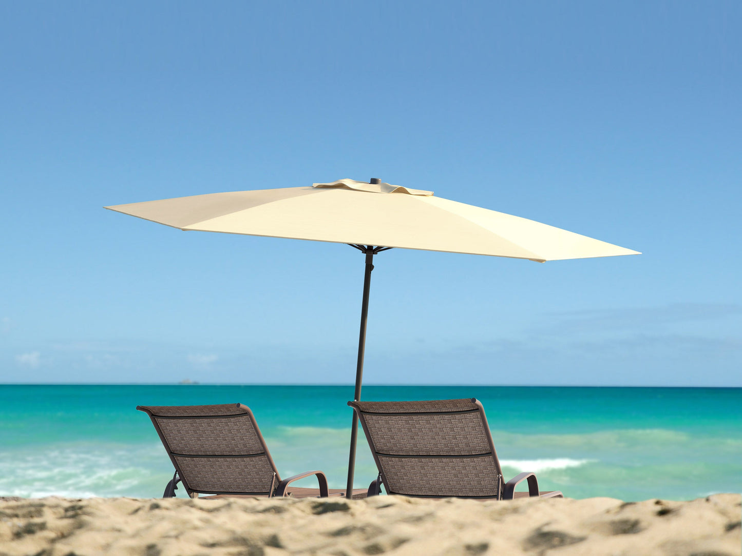 Warm white 7.5ft beach umbrella with UV protection, featuring a sturdy aluminum pole and tilt mechanism for adjustable shade. Ideal for outdoor use, providing ample coverage and stylish beachside comfort.
