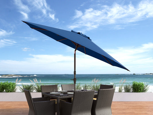 10ft wind-resistant cobalt blue patio umbrella with sturdy aluminum frame, UV protection fabric, and easy crank lift system for outdoor use.