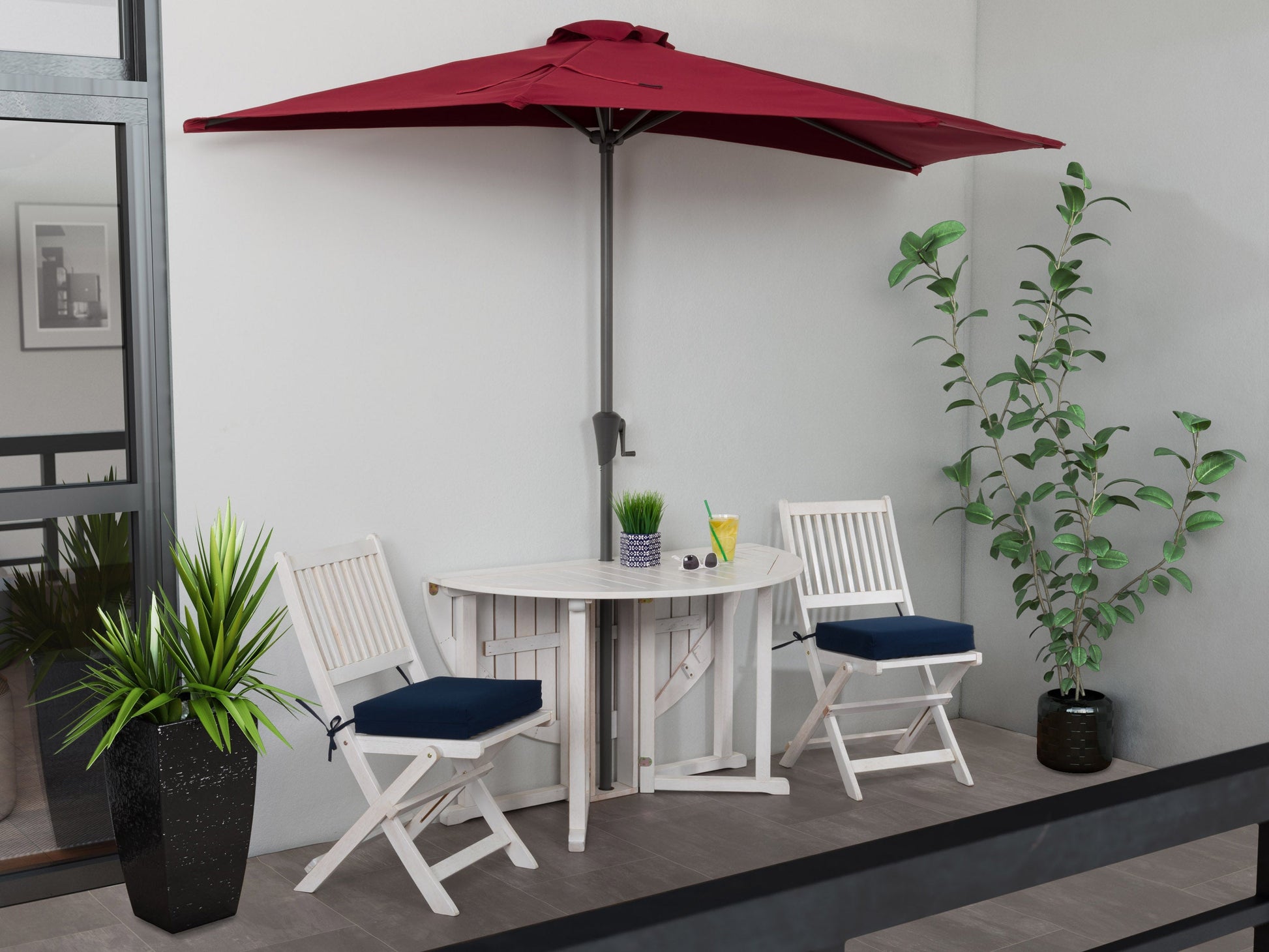 Red 8.5ft half umbrella with durable polyester fabric, sturdy aluminum frame, and crank lift system; perfect for small patios and balconies.