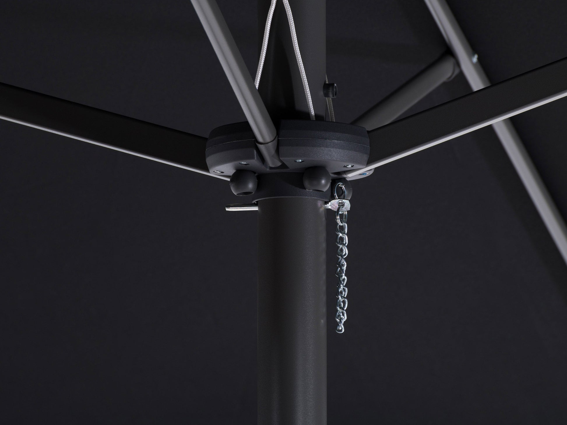 Black 15ft double patio umbrella with sturdy metal frame, UV-resistant fabric, and crank lift system, providing ample shade for outdoor seating areas. Ideal for large patios and garden spaces.