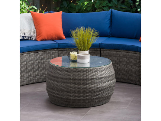 Natural wicker coffee table with glass top, featuring a round design and sturdy rattan construction, perfect for outdoor patio settings. Ideal for stylish, durable, and weather-resistant outdoor furniture.