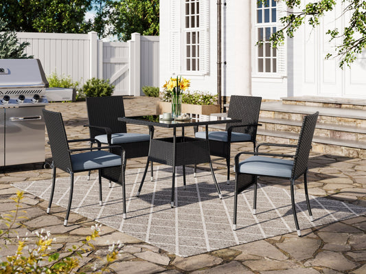Modern 5-piece patio dining set with a rectangular glass table and four cushioned chairs in beige and brown wicker, featuring weather-resistant materials and a sleek design perfect for outdoor spaces.