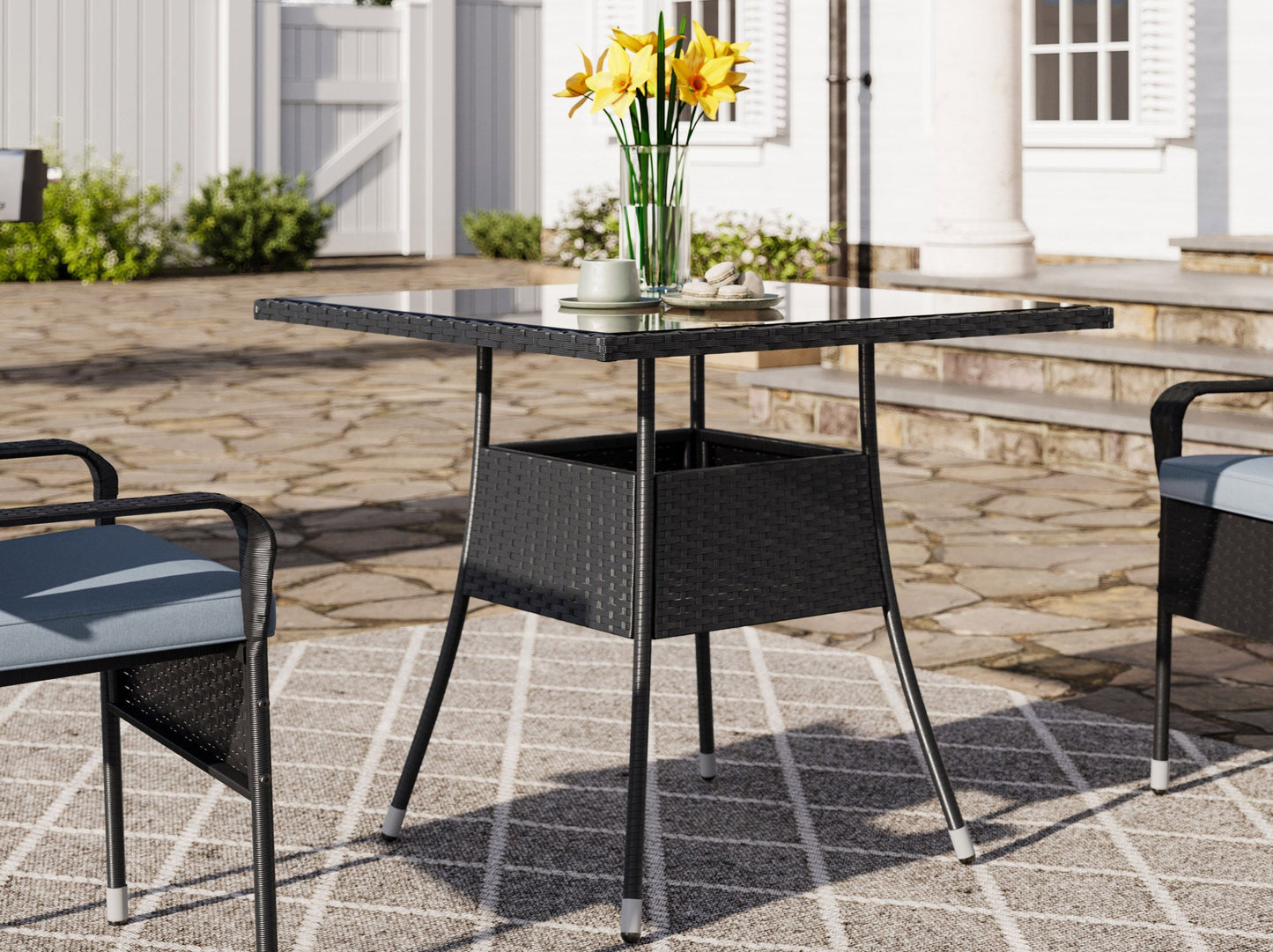 Modern 5-piece patio dining set with a rectangular glass table and four cushioned chairs in beige and brown wicker, featuring weather-resistant materials and a sleek design perfect for outdoor spaces.