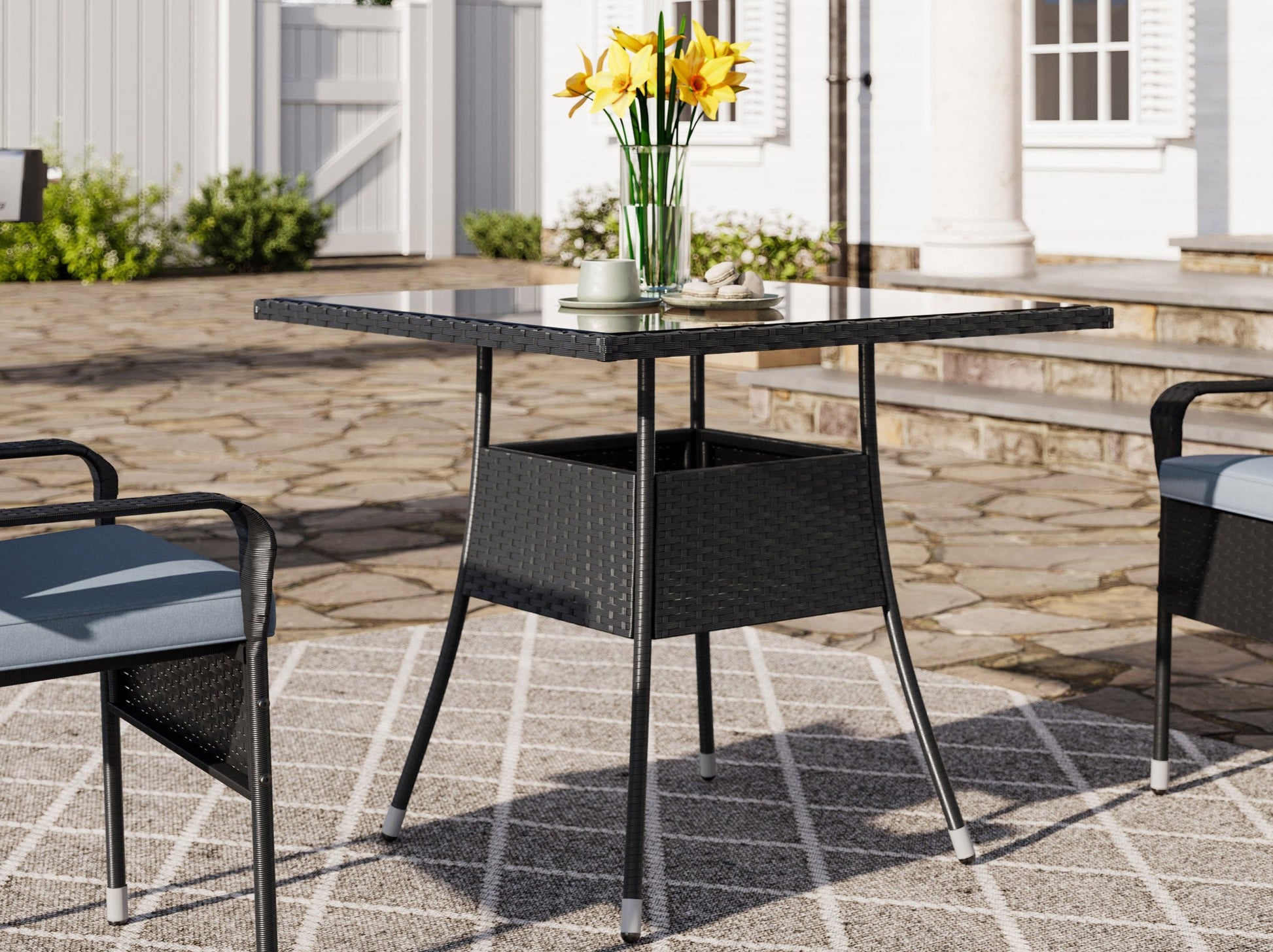 Modern 5-piece patio dining set with a rectangular glass table and four cushioned chairs in beige and brown wicker, featuring weather-resistant materials and a sleek design perfect for outdoor spaces.