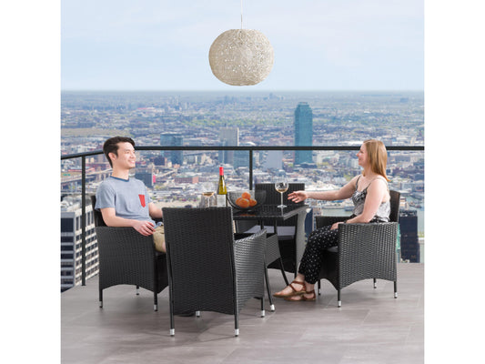 Modern 5-piece patio dining set with a rectangular glass table and four cushioned chairs in beige and brown wicker, featuring weather-resistant materials and a sleek design perfect for outdoor spaces.