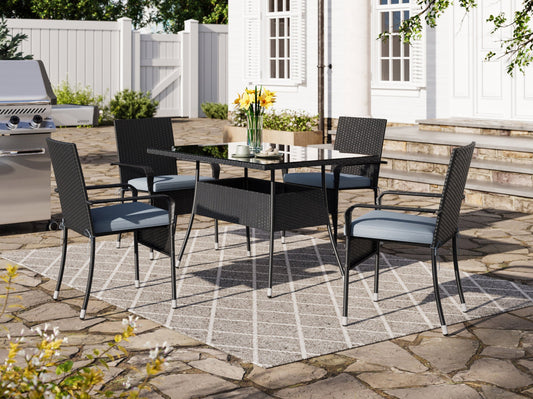 Modern 5-piece patio dining set with a rectangular glass table and four cushioned chairs in beige and brown wicker, featuring weather-resistant materials and a sleek design perfect for outdoor spaces.