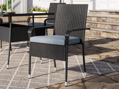 Modern 5-piece patio dining set with a rectangular glass table and four cushioned chairs in beige and brown wicker, featuring weather-resistant materials and a sleek design perfect for outdoor spaces.