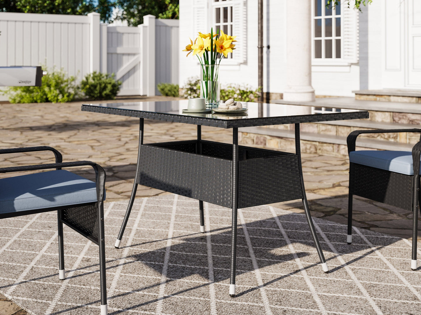 Gray wicker patio dining set with six cushioned chairs, rectangular glass-top table, and weather-resistant materials, perfect for outdoor dining and entertaining.