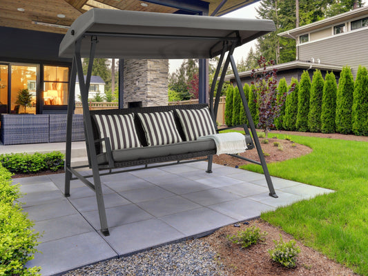 Grey patio swing with canopy, featuring a sturdy metal frame, comfortable cushioned seats, and weather-resistant fabric. Ideal for outdoor relaxation in gardens, patios, or backyards.
