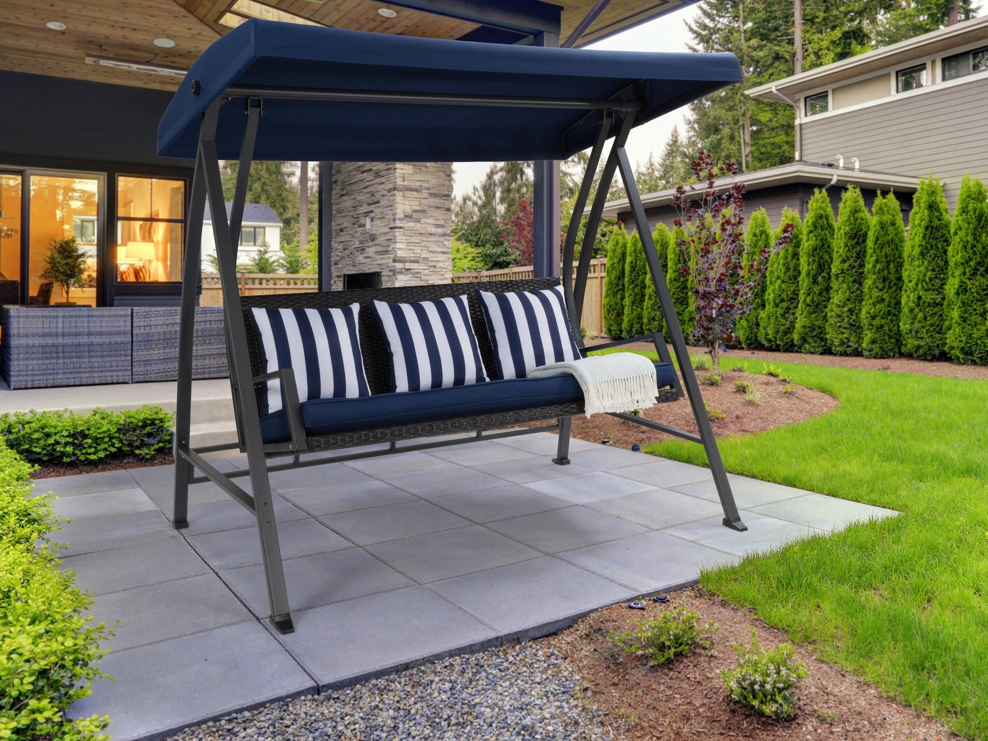 Navy blue patio swing with canopy, cushioned seats, sturdy steel frame, and adjustable sunshade. Ideal for outdoor relaxation and garden decor.