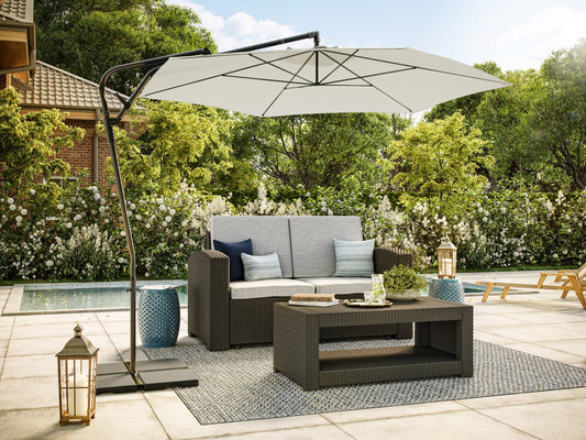 10ft cantilever patio umbrella in warm white with tilting feature, sturdy aluminum frame, and UV-resistant canopy, perfect for outdoor shading and garden decor.