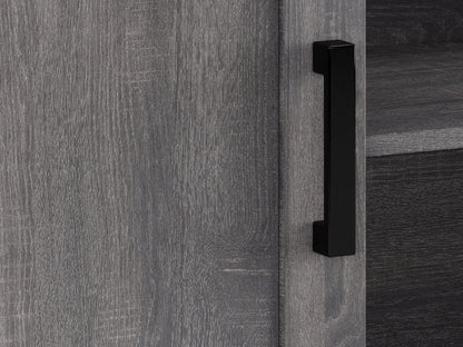 Dark grey TV stand with doors, designed for TVs up to 85 inches. Features sleek, modern design, smooth finish, and ample storage space for media devices and accessories.