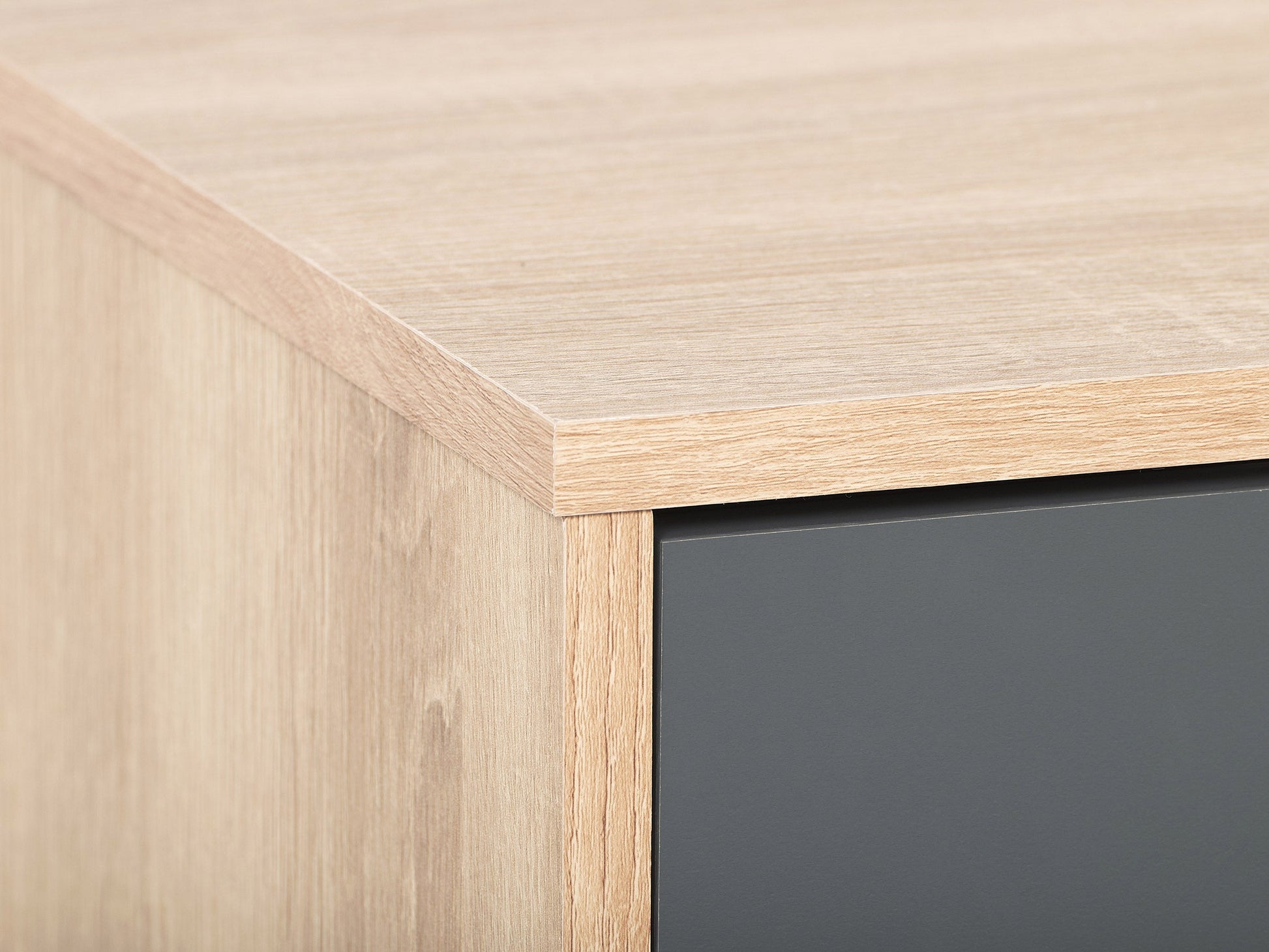 Light wood and grey TV stand with cabinet storage, fits TVs up to 85 inches, featuring sleek design, smooth textures, and ample storage space for media accessories.