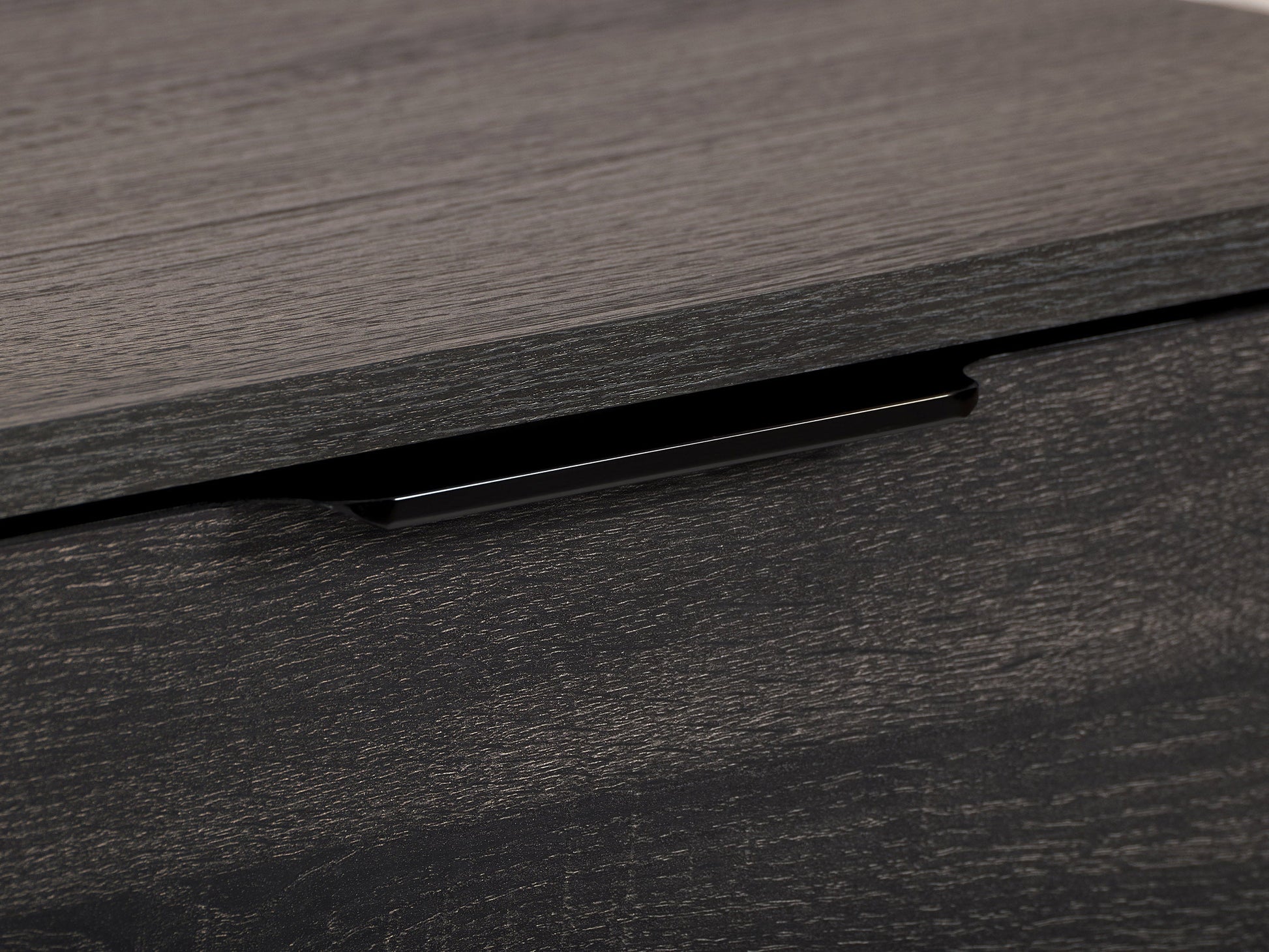 Dark grey TV stand with cabinet storage, suitable for TVs up to 85 inches, featuring sleek lines, modern design, and ample storage space with multiple compartments and shelves.