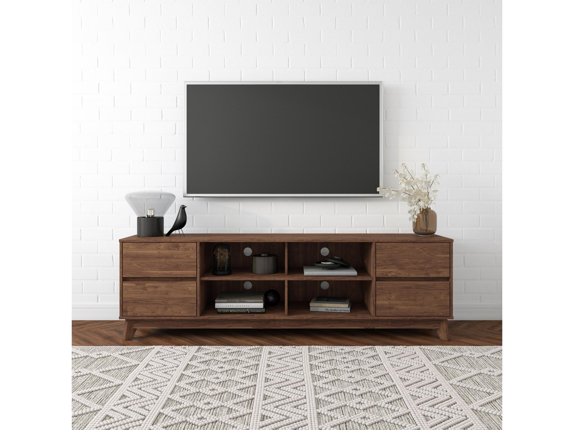 Modern brown TV stand for TVs up to 85 inches, featuring sleek lines, wood finish, open shelving, and two cabinets with metal handles for storage. Ideal for contemporary living rooms.