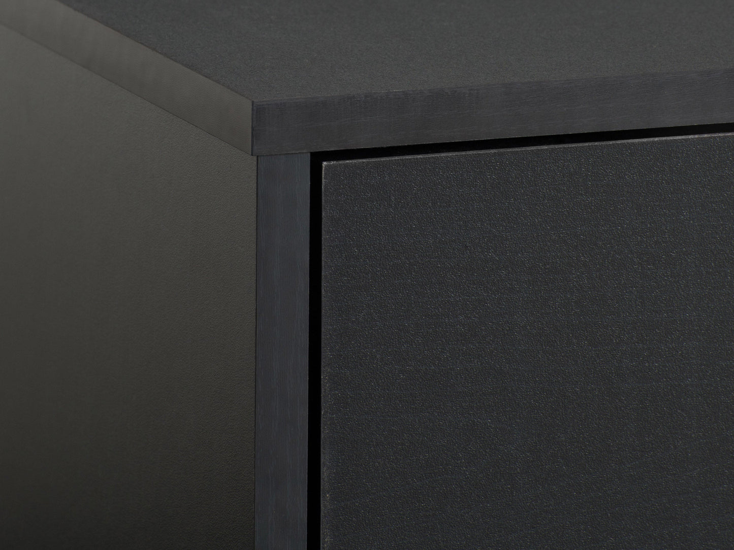 Modern black TV stand for TVs up to 85 inches, featuring sleek lines, minimalist design, and ample storage with open shelves and cabinets. Made of durable materials with a smooth finish.