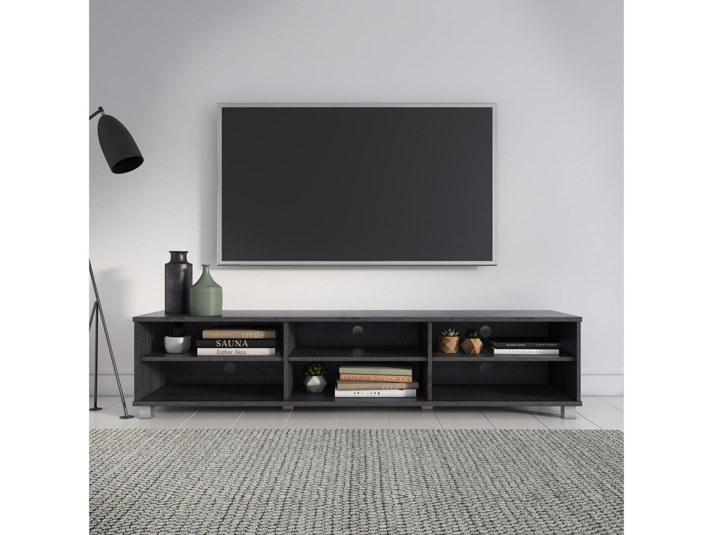 Grey modern TV stand for TVs up to 85 inches, featuring sleek lines, minimalist design, and ample storage with open shelves and cabinets. Made from durable wood with a smooth finish, perfect for contemporary living rooms.