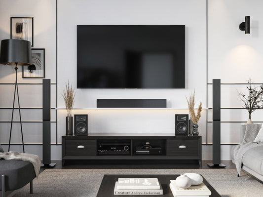 Black TV stand for TVs up to 85 inches, featuring sleek black finish, sturdy metal frame, tempered glass shelves, and cable management system. Ideal for modern living rooms and home theaters.