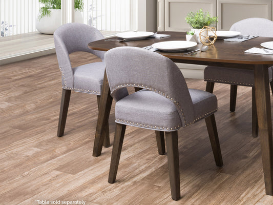 Set of 2 grey mid-century dining chairs with cushioned seats, wooden legs, and sleek design, perfect for modern dining rooms or kitchens.