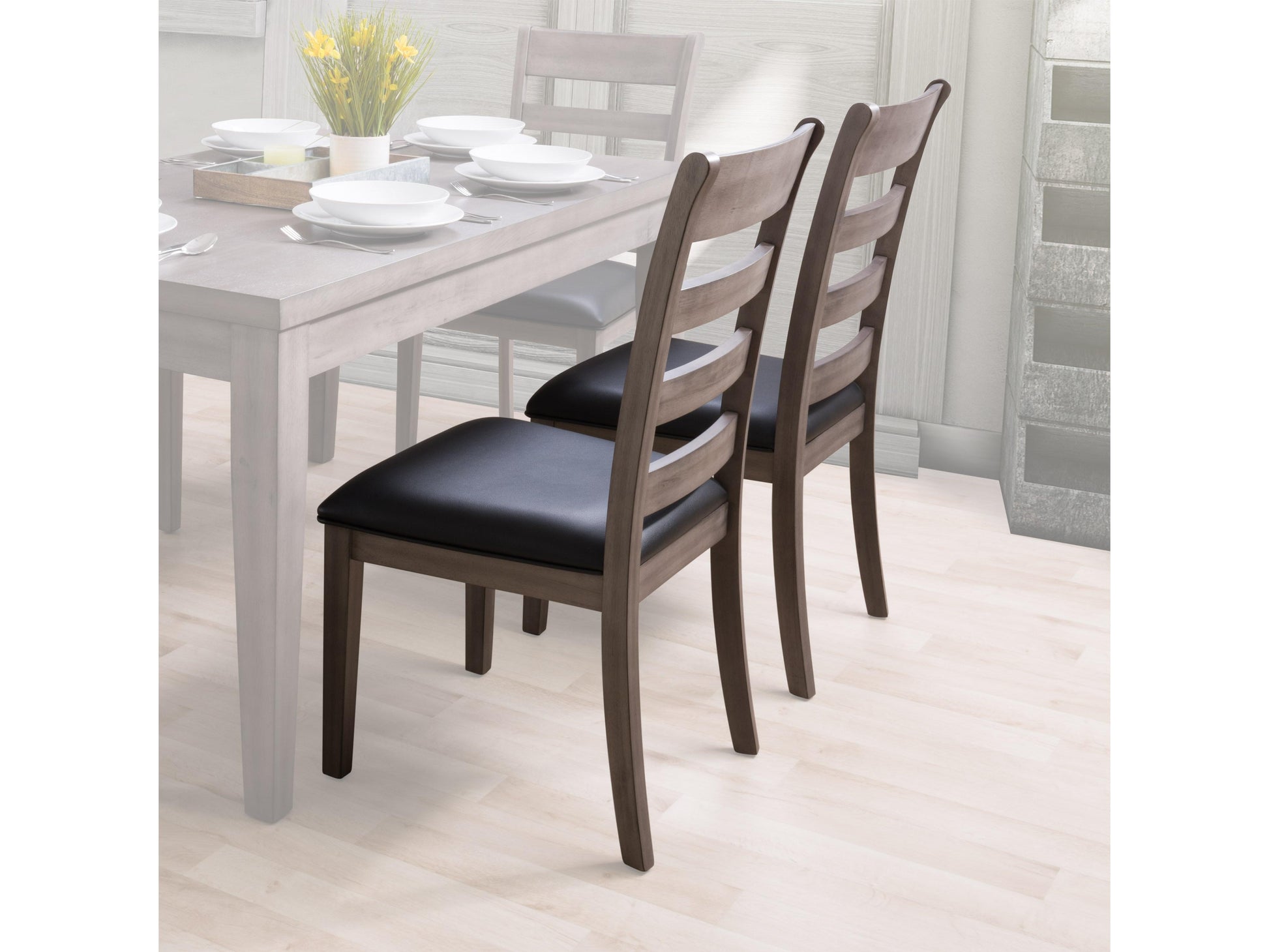 Set of two grey wood dining chairs with cushioned seats, featuring a sleek, modern design and sturdy wooden legs, perfect for contemporary dining rooms and kitchens.