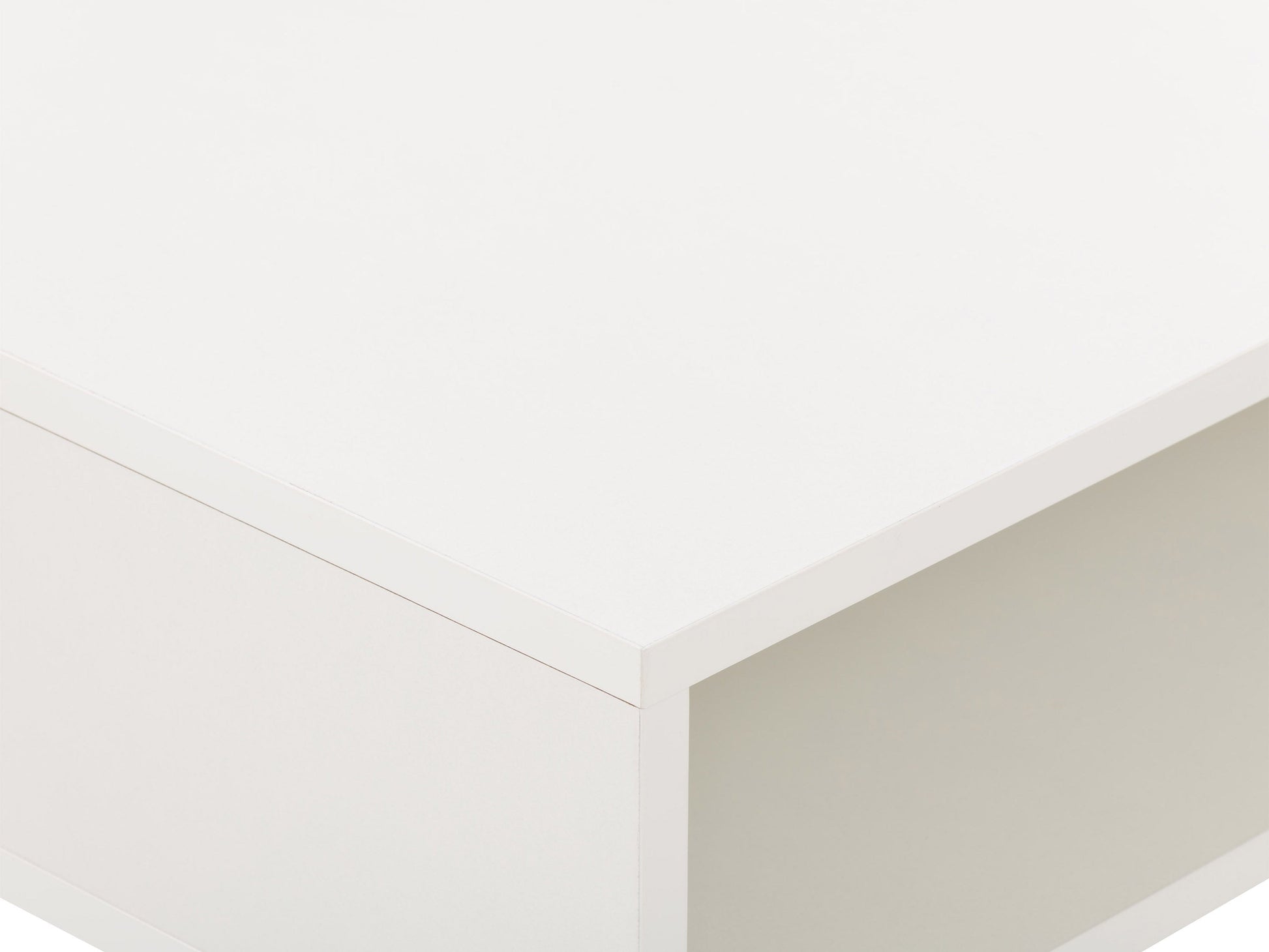 Modern white computer desk with sleek metal legs, spacious tabletop, built-in cable management, and minimalist design. Ideal for home office or study.