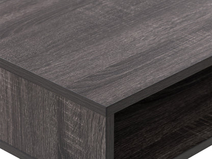 Sleek modern computer desk in grey with a smooth laminate surface, sturdy metal frame, and built-in cable management, ideal for home offices or workspaces.