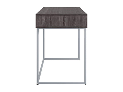 Sleek modern computer desk in grey with a smooth laminate surface, sturdy metal frame, and built-in cable management, ideal for home offices or workspaces.