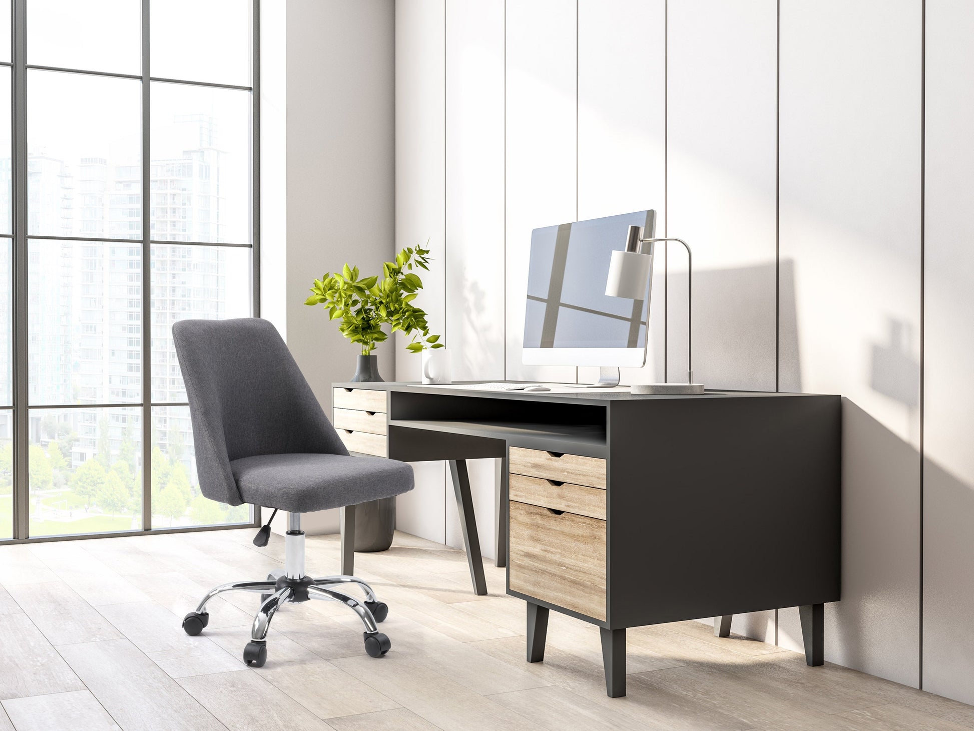 Dark grey armless task chair featuring a cushioned seat and backrest with sleek, modern design, perfect for office use. Upholstered in durable fabric, supported by a sturdy metal base with smooth-rolling casters.