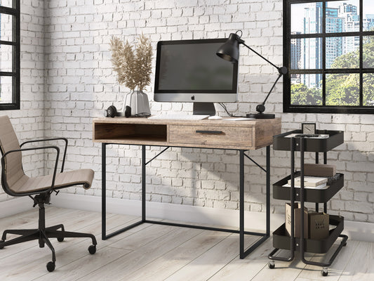 Modern wood computer desk with sleek black metal frame, spacious light wood tabletop, built-in storage shelf, and minimalist design, perfect for home office or study space.