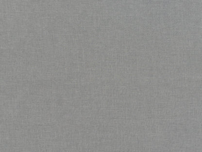 Gray fabric ottoman with tufted square design, wooden legs, and soft linen texture. Ideal for living room or bedroom decor, providing both seating and storage functionality.