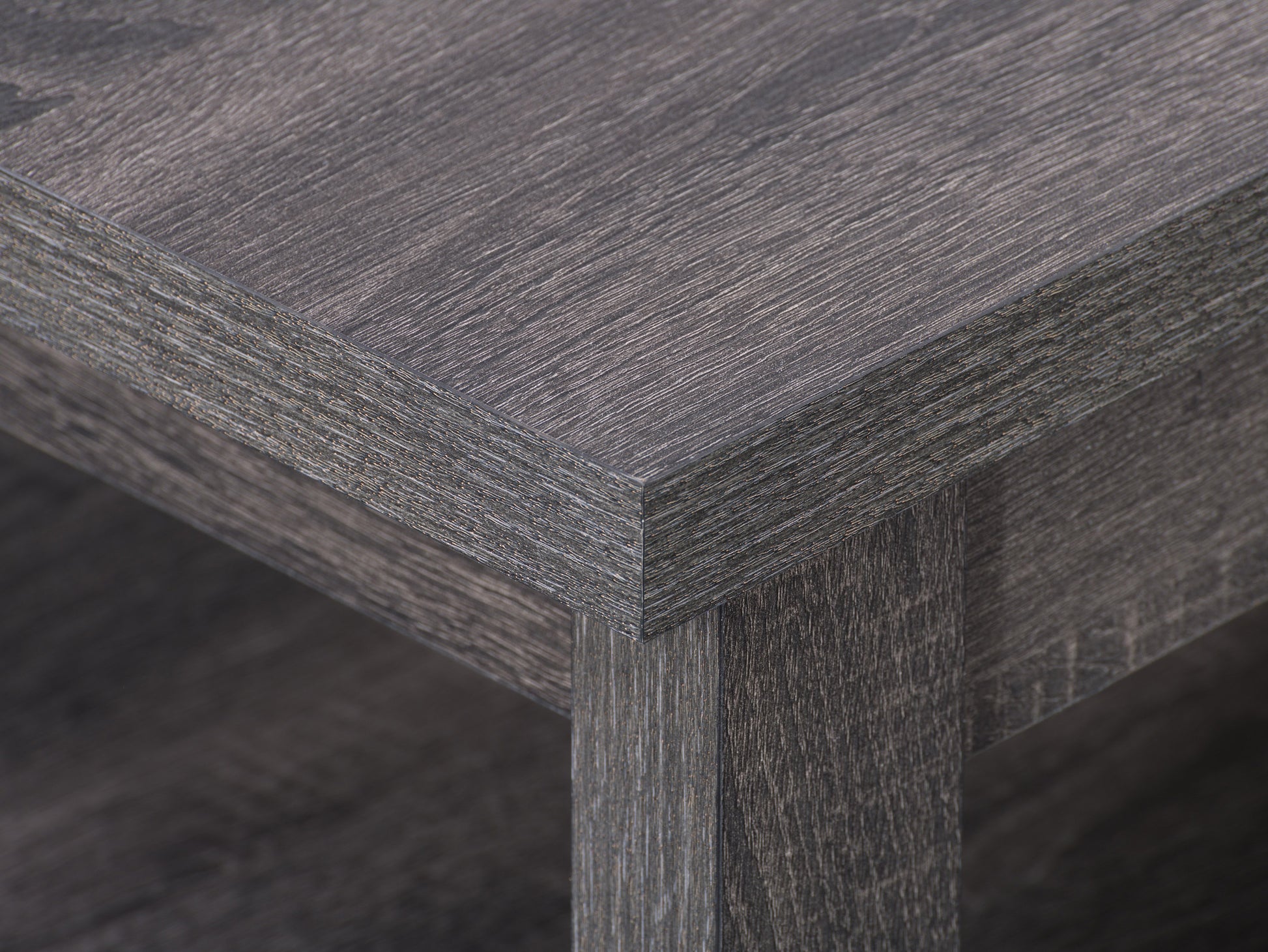 Mid-century modern coffee table with walnut wood finish, featuring a sleek rectangular top, tapered legs, and smooth edges. Ideal for living rooms, this stylish piece combines functionality with timeless design.