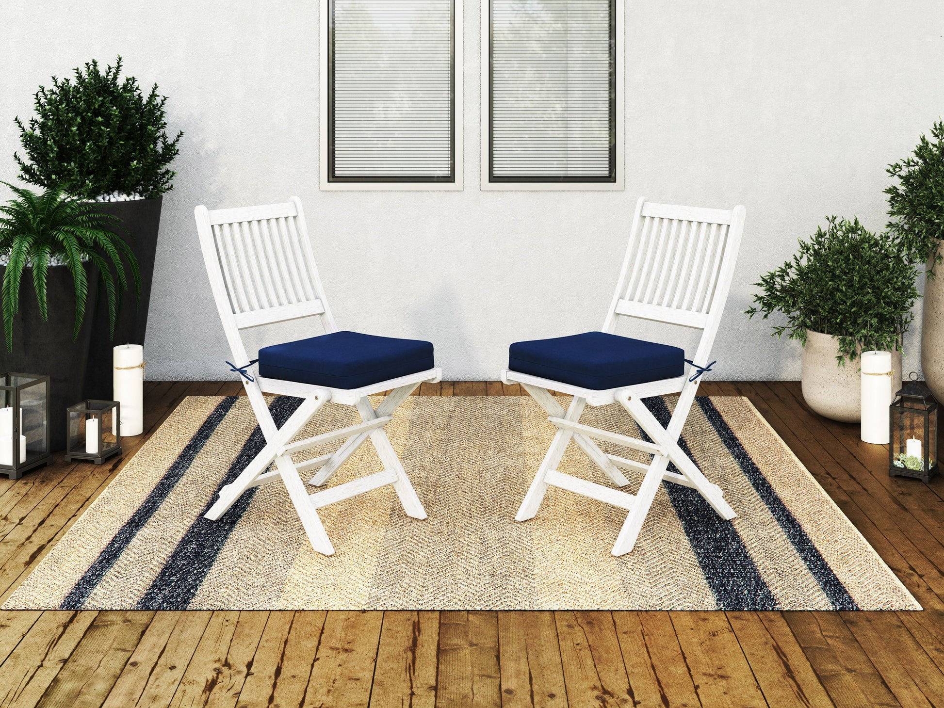 Set of 2 outdoor wood folding patio chairs with slatted seats and backs in natural wood finish, featuring sturdy metal frames and armrests, perfect for garden, balcony, or deck seating.