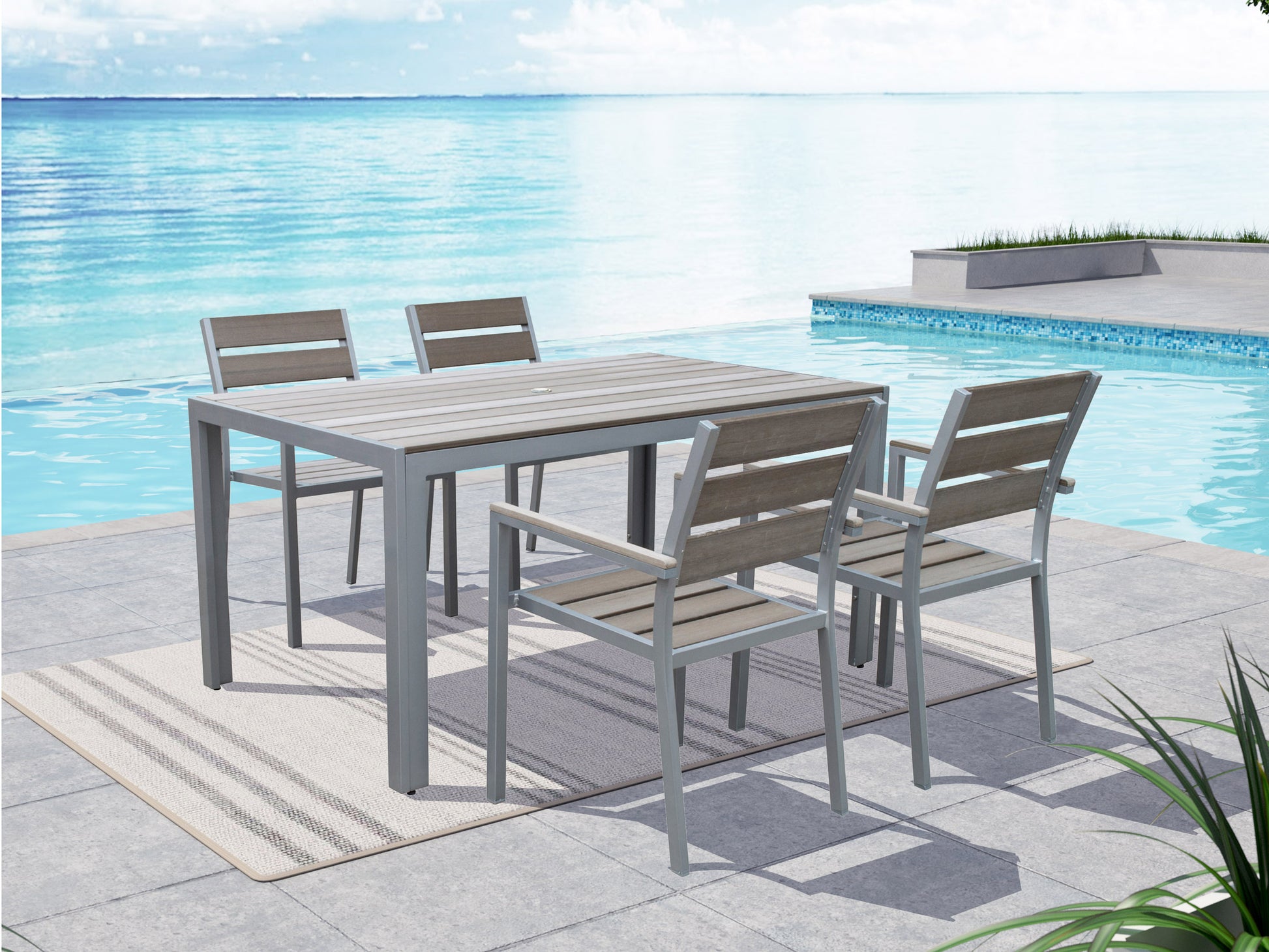 Gray outdoor patio dining set with four cushioned chairs and a rectangular table, featuring a slatted tabletop and sturdy metal frame, perfect for alfresco dining and entertaining.
