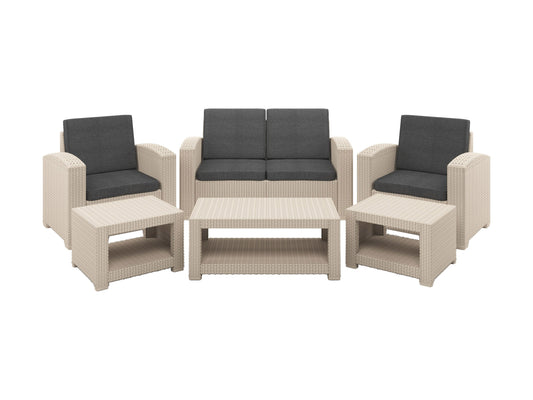 6 piece patio conversation set with gray wicker, navy blue cushions, and glass-top coffee table. Includes sofa, two armchairs, two ottomans, and a side table, perfect for outdoor lounging and entertaining.