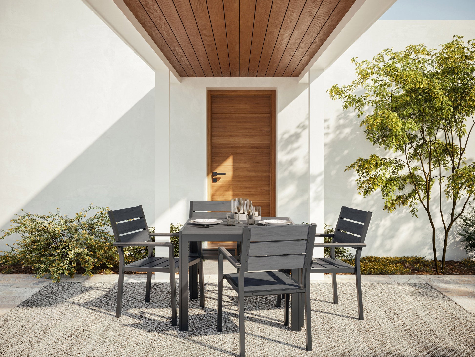 Modern outdoor dining set with a rectangular, glass-top table and four cushioned chairs in beige and brown wicker. Durable, weather-resistant materials perfect for patio or garden dining. Elegant and comfortable design.