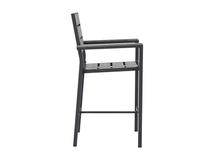 Set of two outdoor patio bar stools with teak wood seats, black metal frames, and footrests. The stools feature weather-resistant materials and a sleek, modern design, perfect for outdoor entertaining spaces.