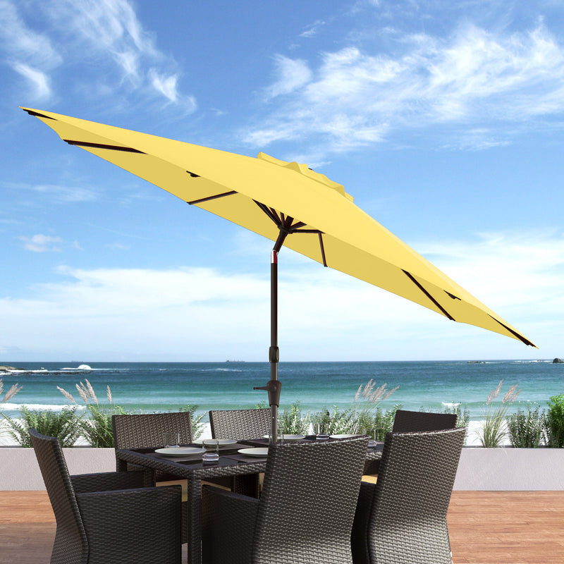 yellow large patio umbrella, tilting with base 700 Series lifestyle scene CorLiving