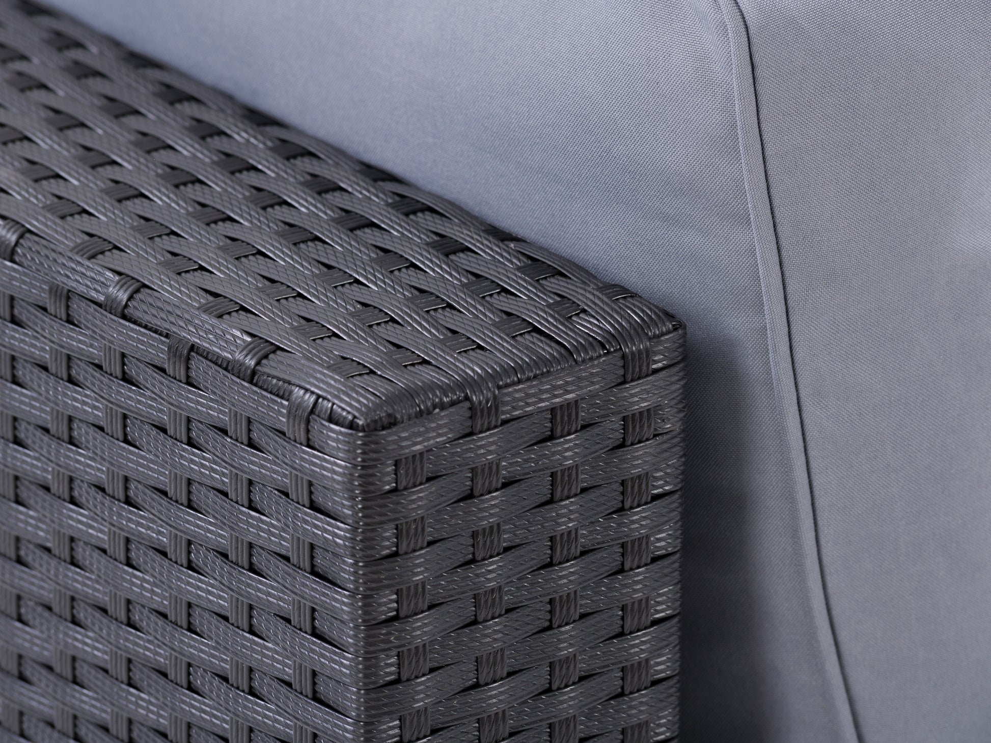5-piece outdoor patio conversation set with gray cushions, dark wicker frame, and a glass-top coffee table. The set includes a loveseat, two armchairs, and a corner sofa, perfect for stylish outdoor lounging.