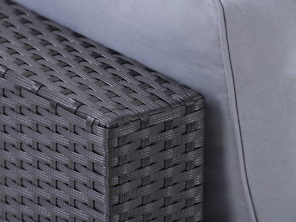 5-piece outdoor patio conversation set with gray cushions, dark wicker frame, and a glass-top coffee table. The set includes a loveseat, two armchairs, and a corner sofa, perfect for stylish outdoor lounging.