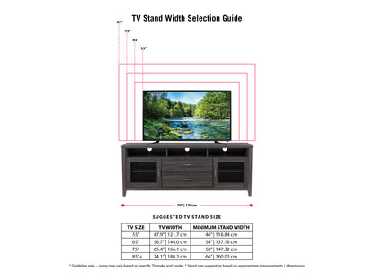 Grey wood TV stand for TVs up to 85 inches with two sliding barn doors, black metal hardware, and open shelving for storage.