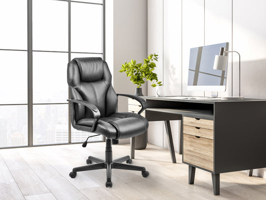Ergonomic black office chair with mesh backrest, padded seat, adjustable armrests, and five-wheel base on wooden floor. Ideal for home or office workspace, providing comfort and support for long hours.